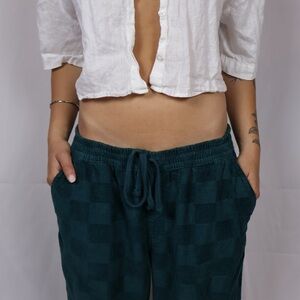 White Button-Up Shirt and Teal Checkered Pants and clear vans bag